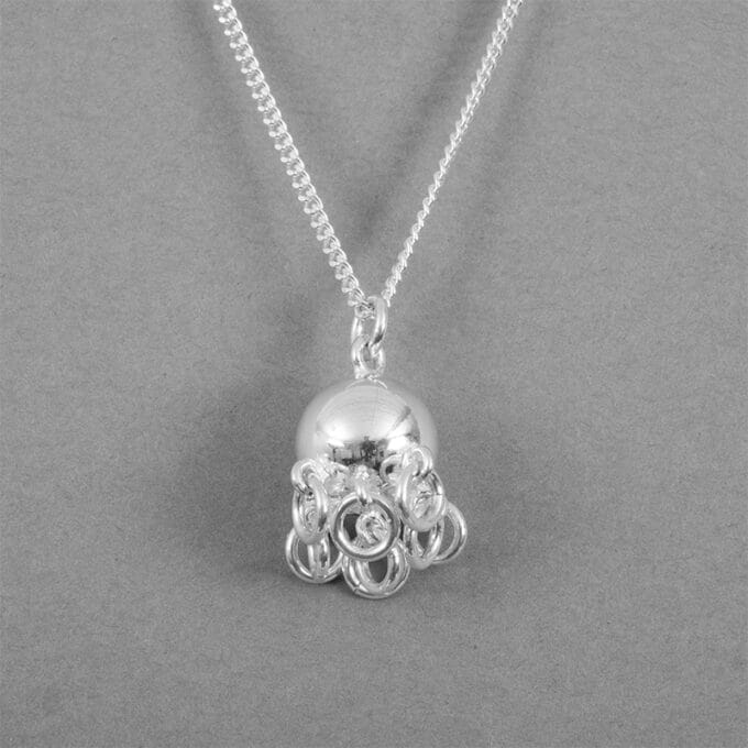 Komsekula medium - silverhalsband